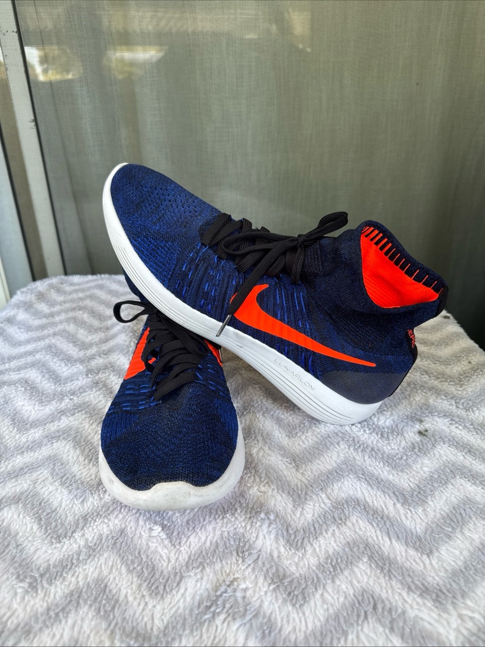 Nike  Flyknit Sneakers - Navy Blue with Bright Orange